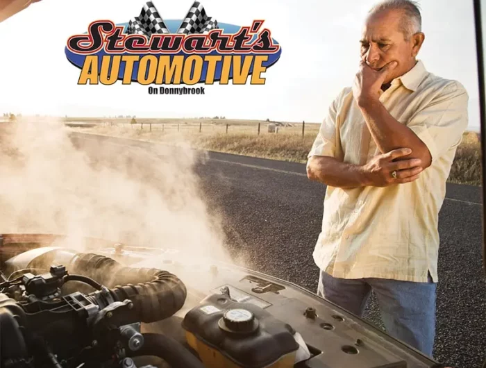 Stewart's Donnybrook Automotive Logo and a man looking at his overheating car engine