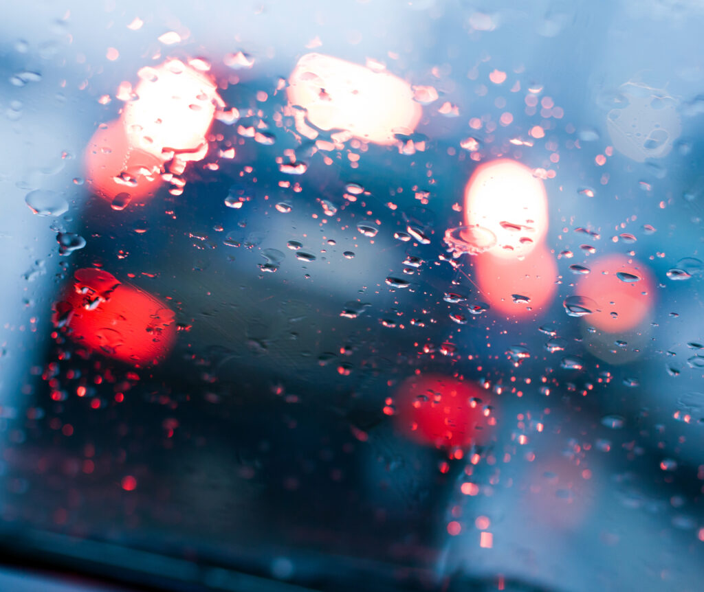 Driver’s view through a windshield in heavy rain